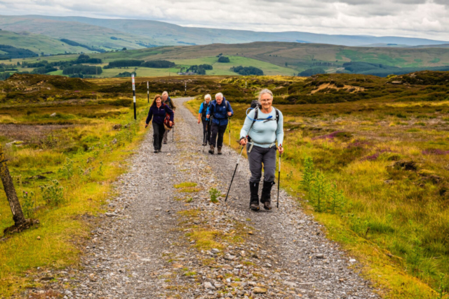 Climbing up past Millstone Quarries.  Cross Fell? on the horizon to the right