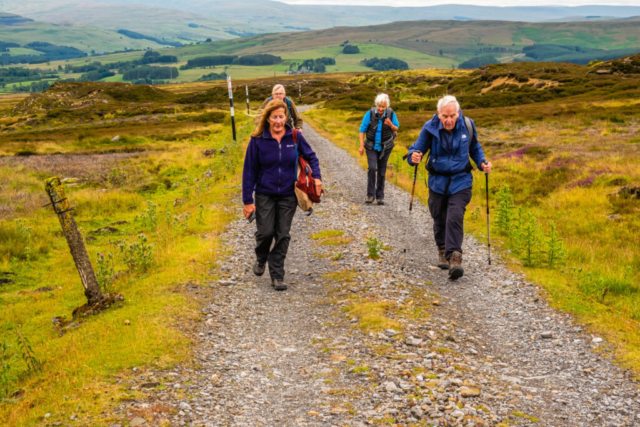 Climbing up past Millstone Quarries.  Cross Fell? on the horizon to the right