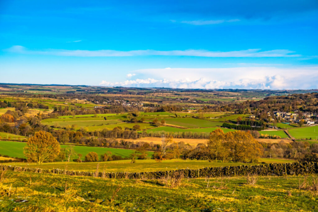View north from the Hill fort with the village of Wall on the right of the picture.