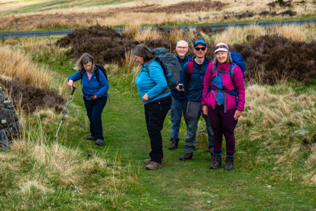 Group looking at the MacDiarmid Memorial info board