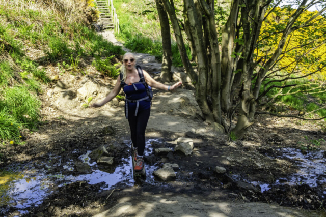 Sharon walking the plank across an almost dried up stream (apologies for slow shutter speed blur)