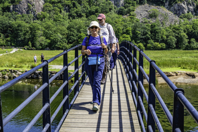 Crossing the footbridge over the R Derwent